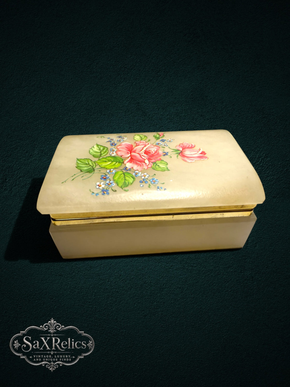 Alabaster trinket box with a hand-painted floral rose design, gold-tone metal trim, and rectangular shape.