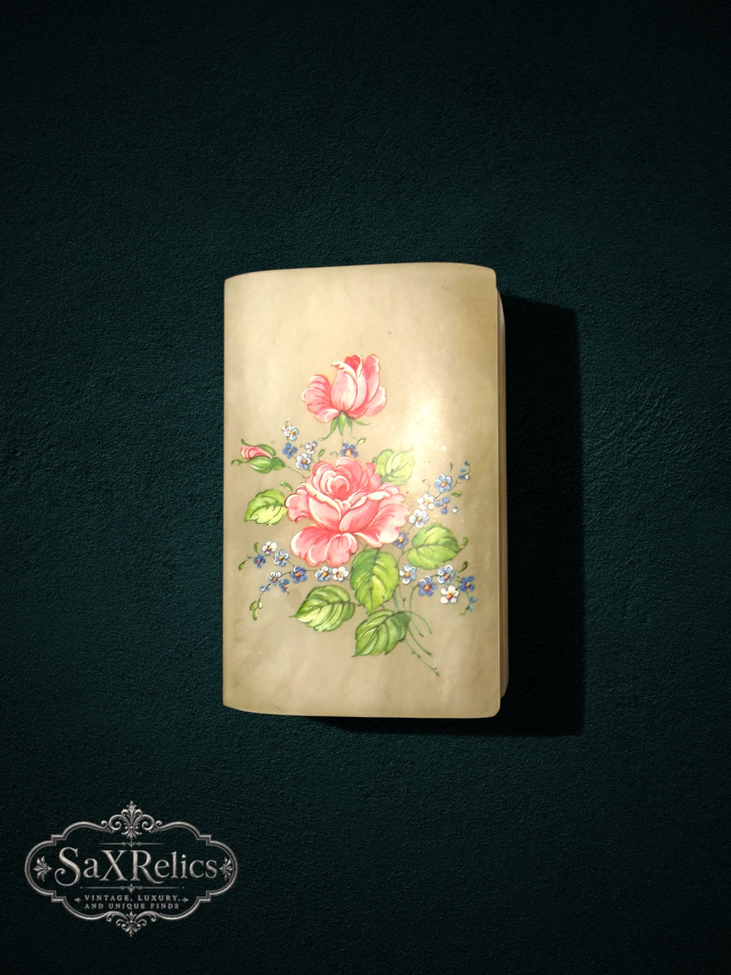 Alabaster trinket box featuring a hand-painted pink rose floral design on a creamy translucent stone surface.