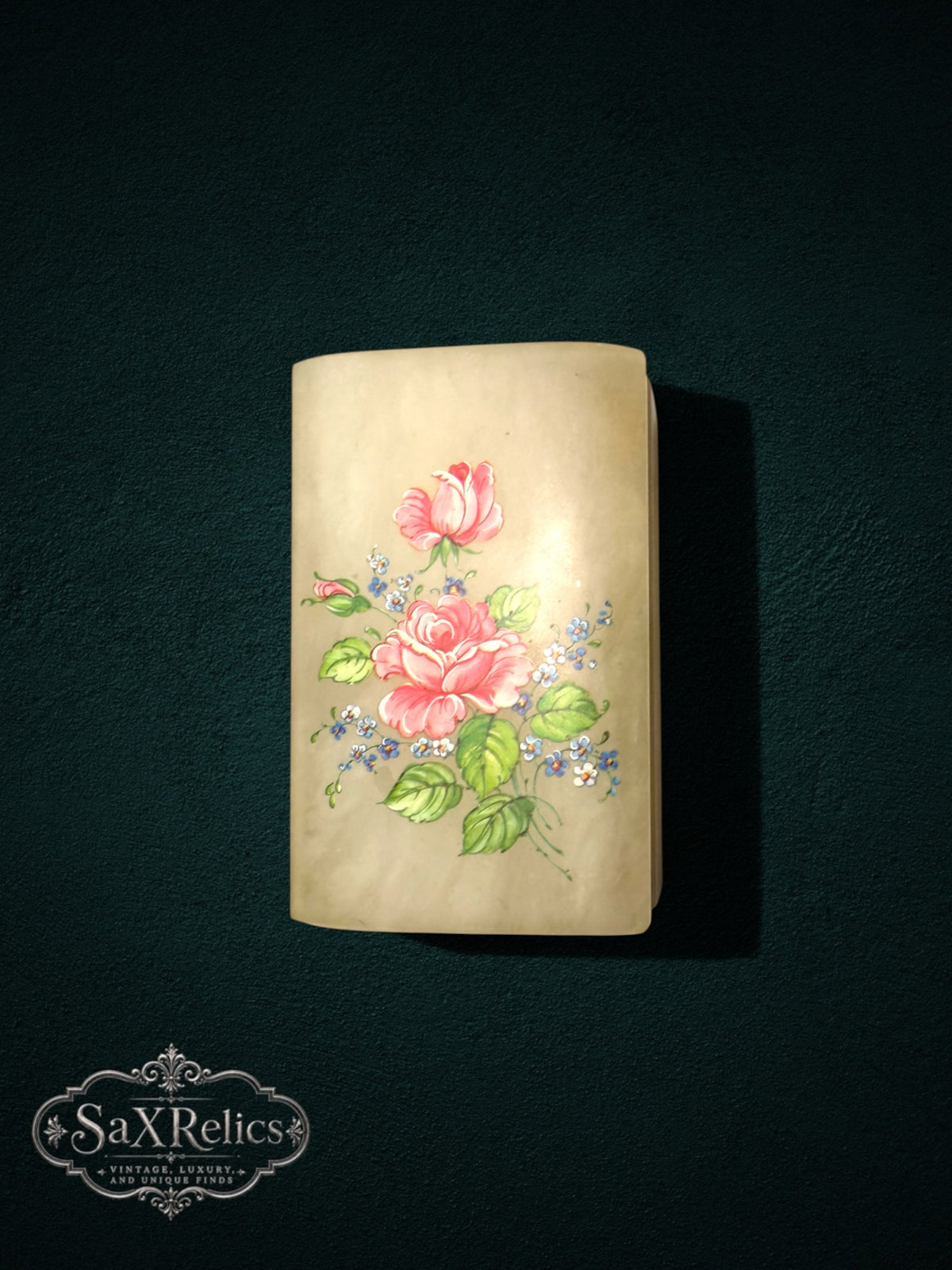 Alabaster trinket box featuring a hand-painted pink rose floral design on a creamy translucent stone surface.
