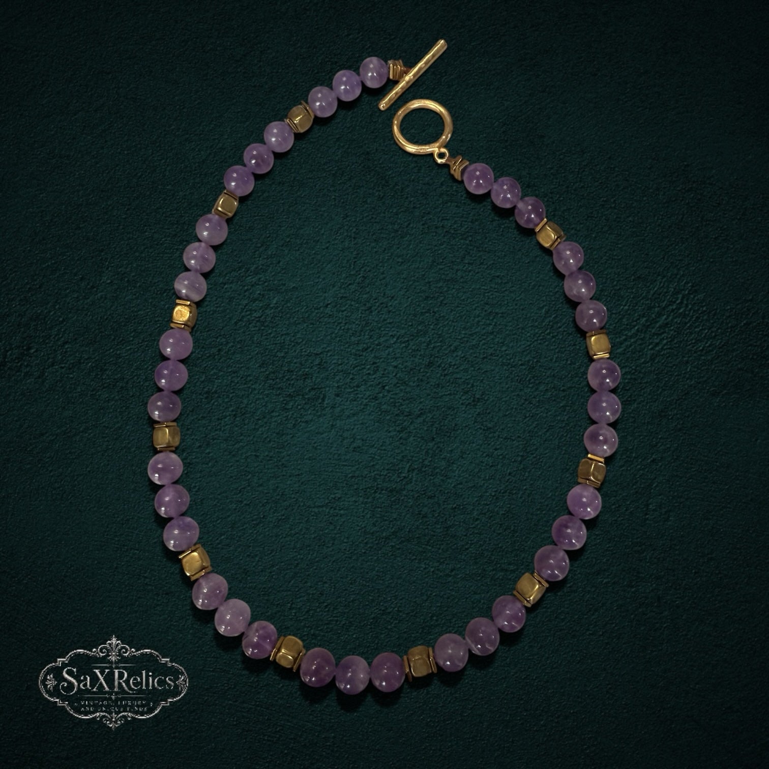 My Store SAXRelics beaded necklace featuring smooth purple amethyst stones and gold-tone spacers with a toggle clasp.