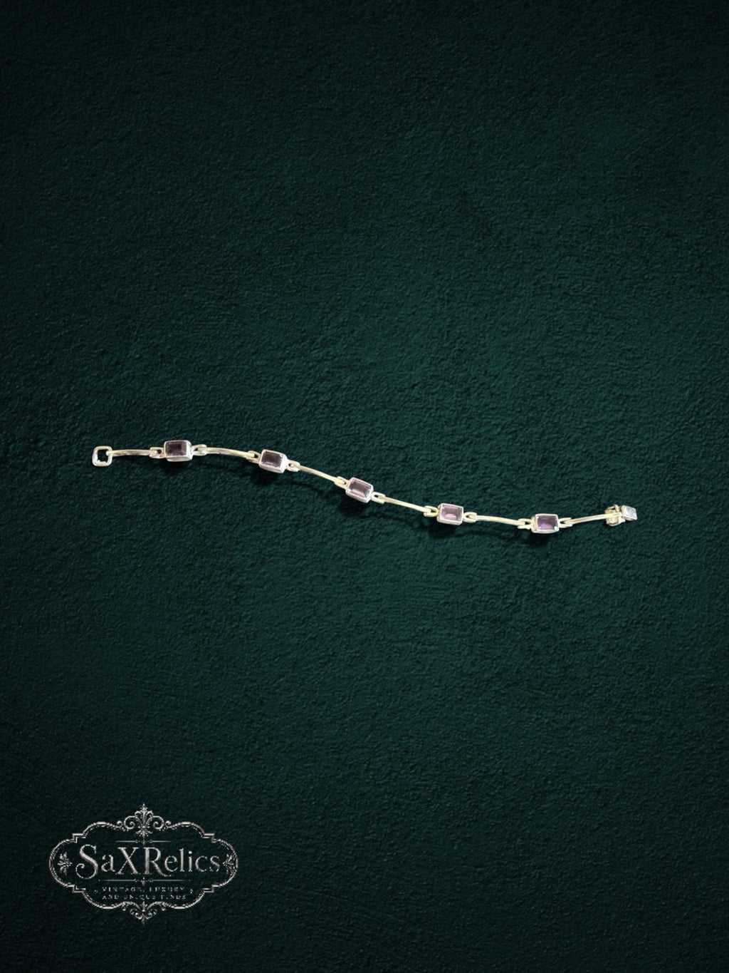 My Store SAXRelics amethyst gemstone link bracelet with rectangular stones set in polished metal on dark background