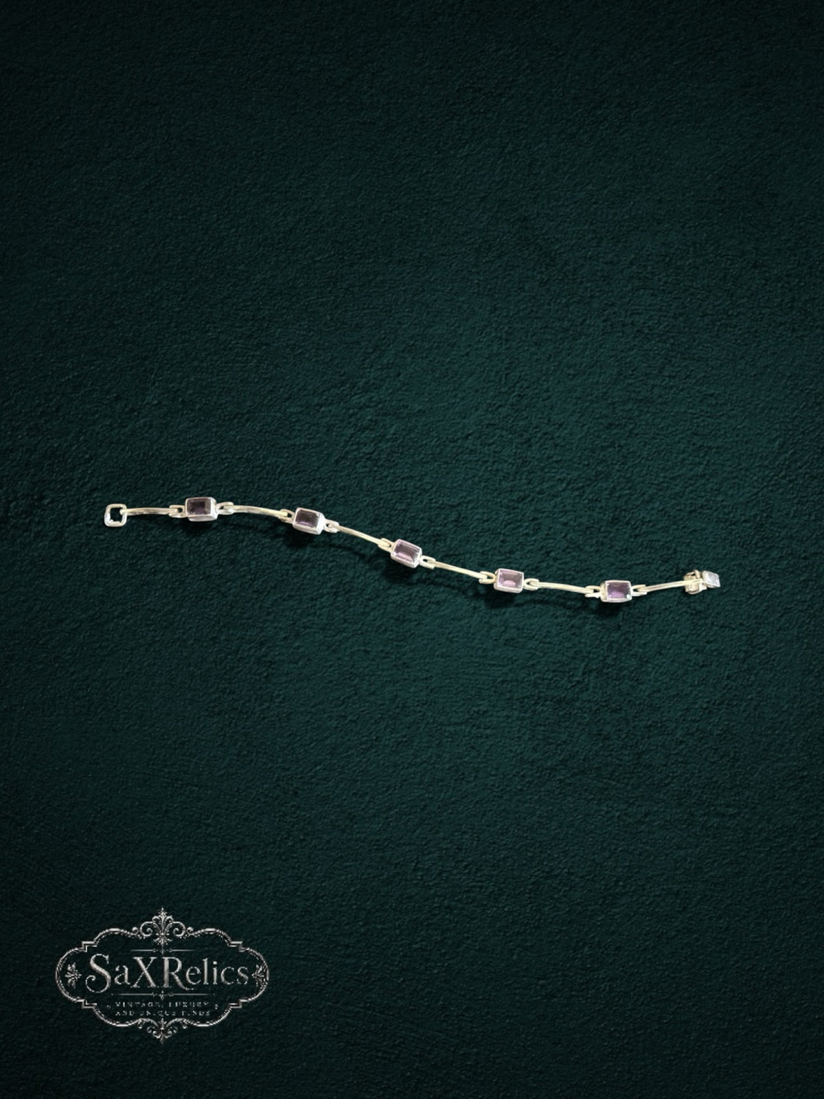My Store SAXRelics amethyst gemstone link bracelet with rectangular stones set in polished metal on dark background