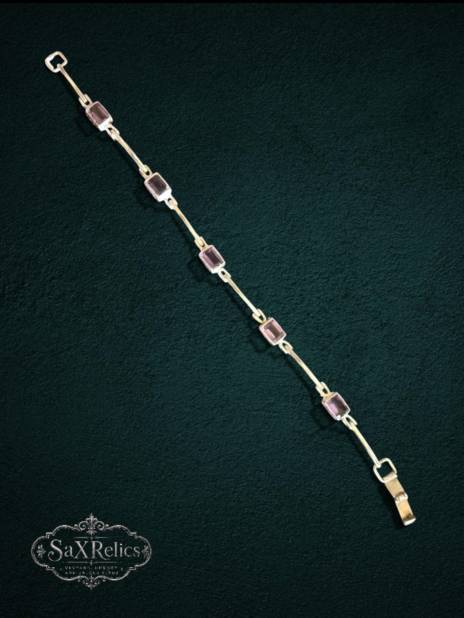 My Store SAXRelics elegant link bracelet featuring rectangular-cut amethyst stones set in polished metal