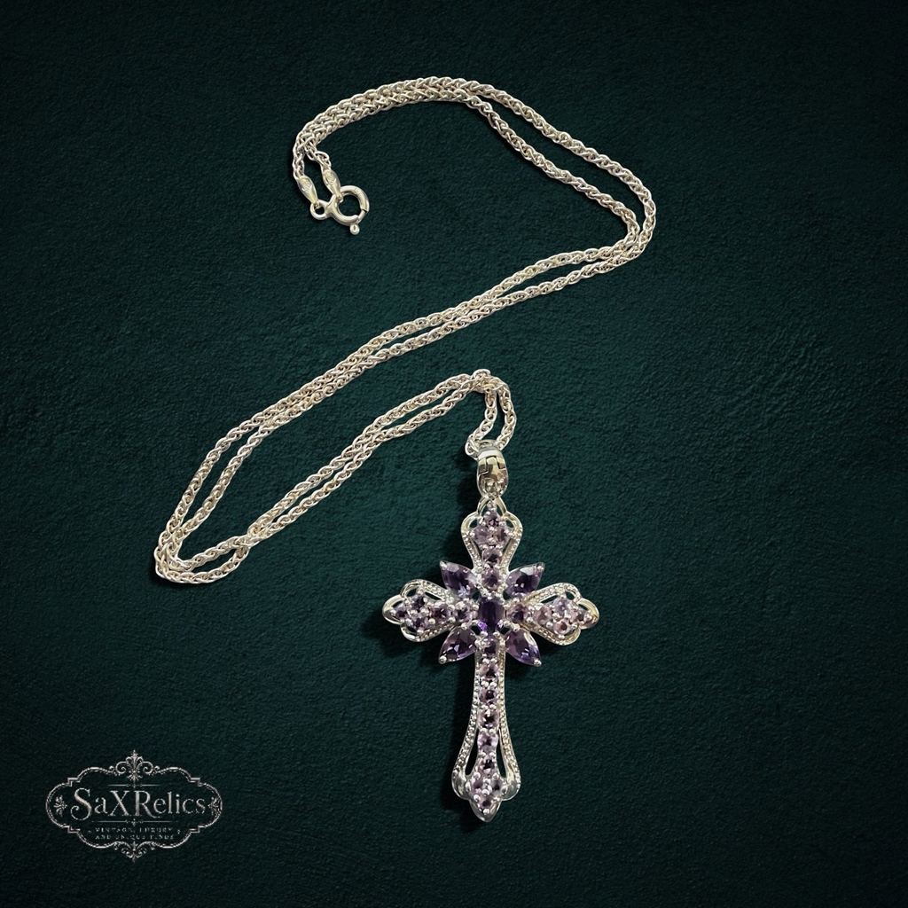 My Store sterling silver cross pendant necklace featuring ornate filigree detailing and deep purple amethyst gemstones.