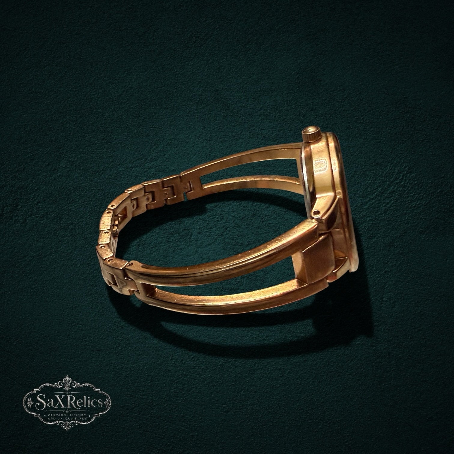 SaX Relics Anne Klein gold-tone open bangle watch showing the open band design