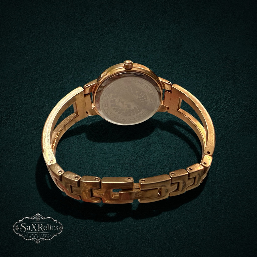 SaX Relics Anne Klein open bangle watch, back view showing the caseback