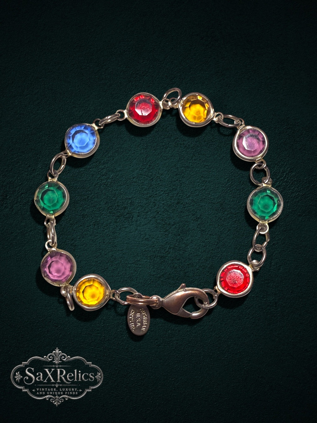 My Store multi-colored Austrian crystal link bracelet with faceted stones and a secure lobster clasp.