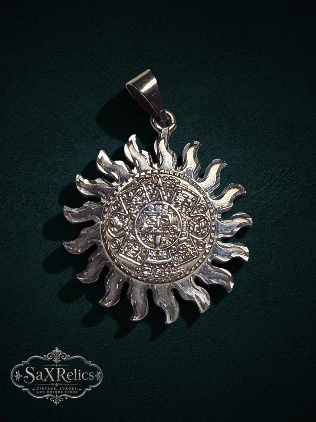 .950 silver Aztec calendar sun pendant with intricate Mesoamerican sunburst detailing