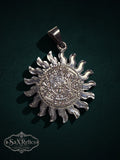 .950 silver Aztec calendar sun pendant with intricate Mesoamerican sunburst detailing