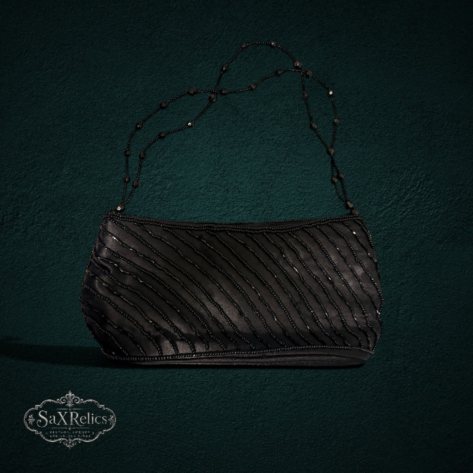 My Store vintage-inspired black beaded evening clutch with diagonal beadwork and a delicate matching strap.