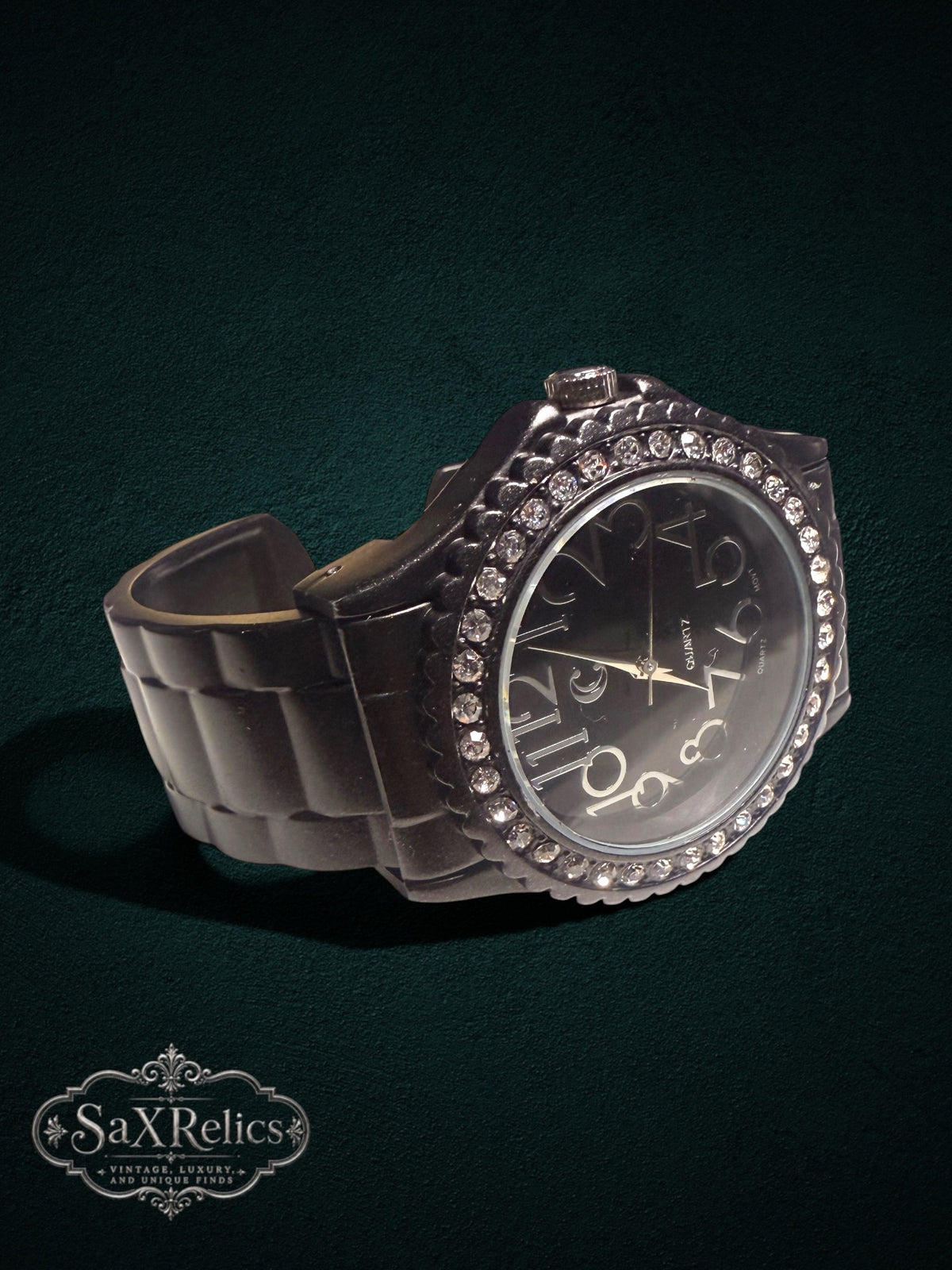 My Store elegant black quartz wristwatch featuring a crystal-encrusted bezel and a sleek cuff-style band.