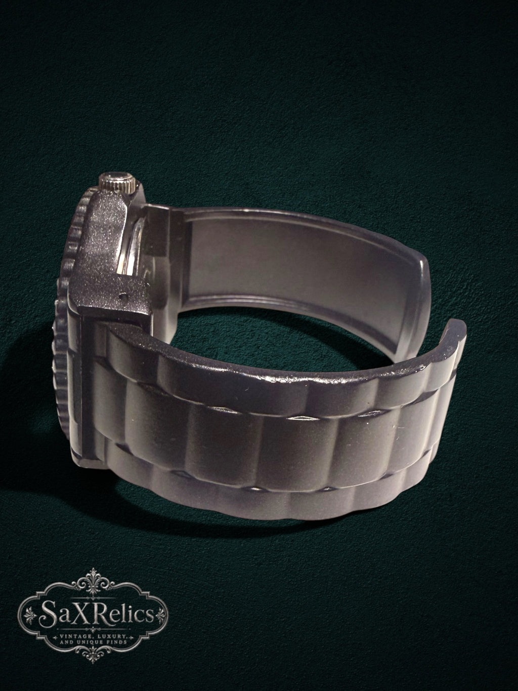 My Store black cuff-style quartz wristwatch with a sleek monochromatic finish and crystal-encrusted bezel