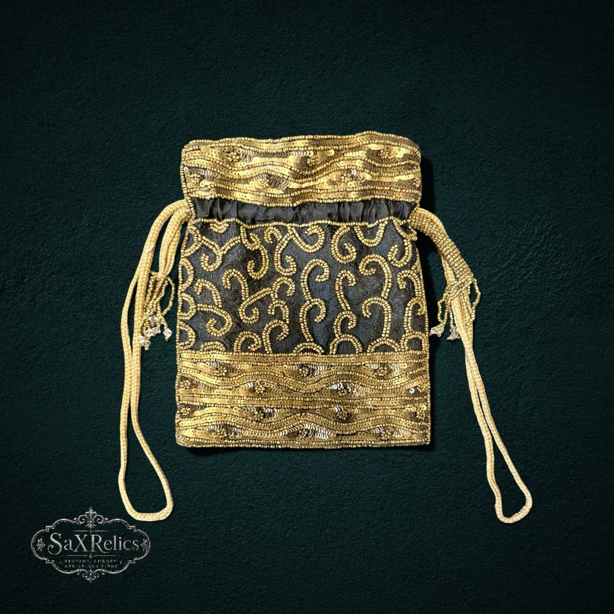 My Store SAXRelics black drawstring pouch featuring intricate gold beadwork and sequin embroidery for evening wear.