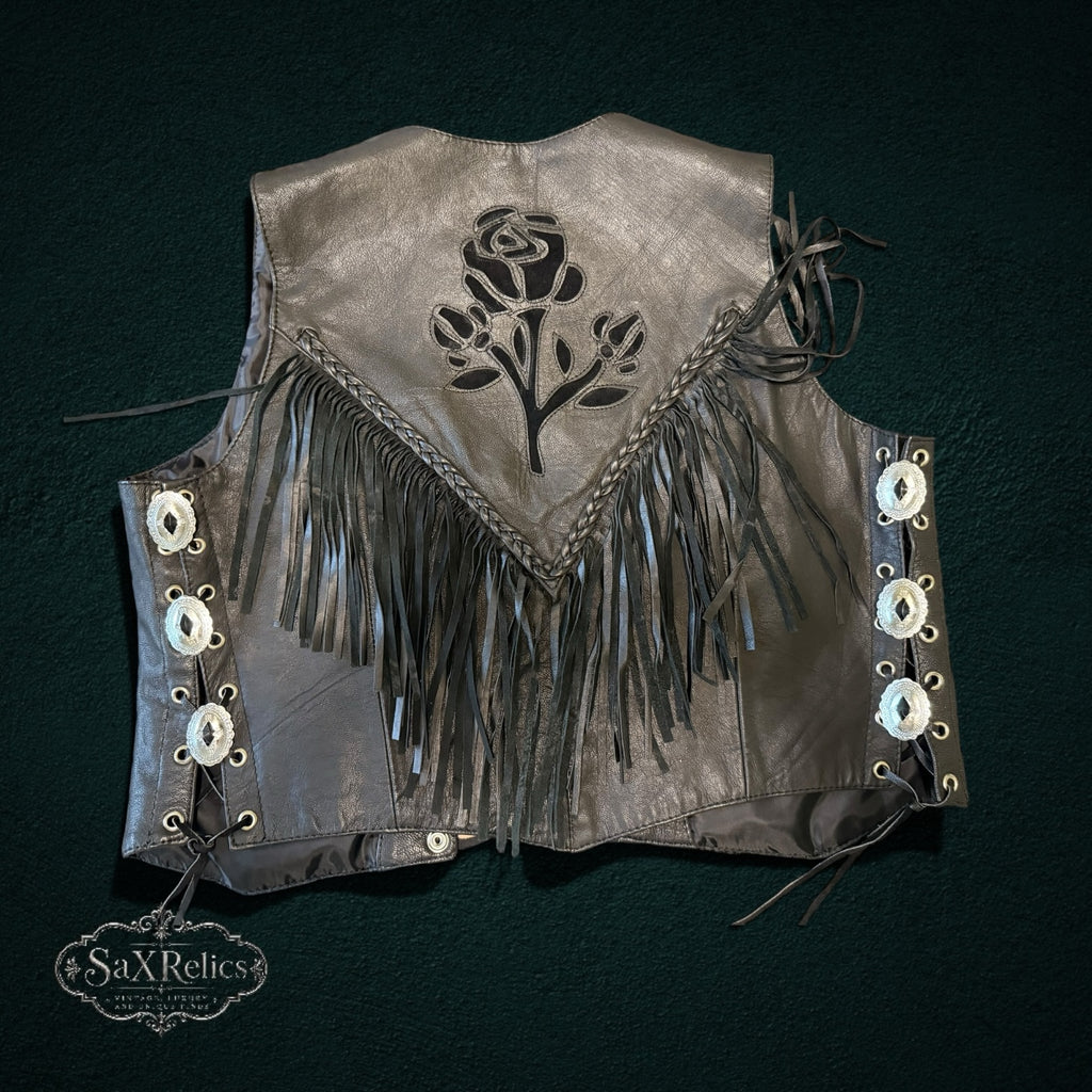My Store black leather motorcycle vest with back fringe, braided trim, and laser-cut rose floral detail