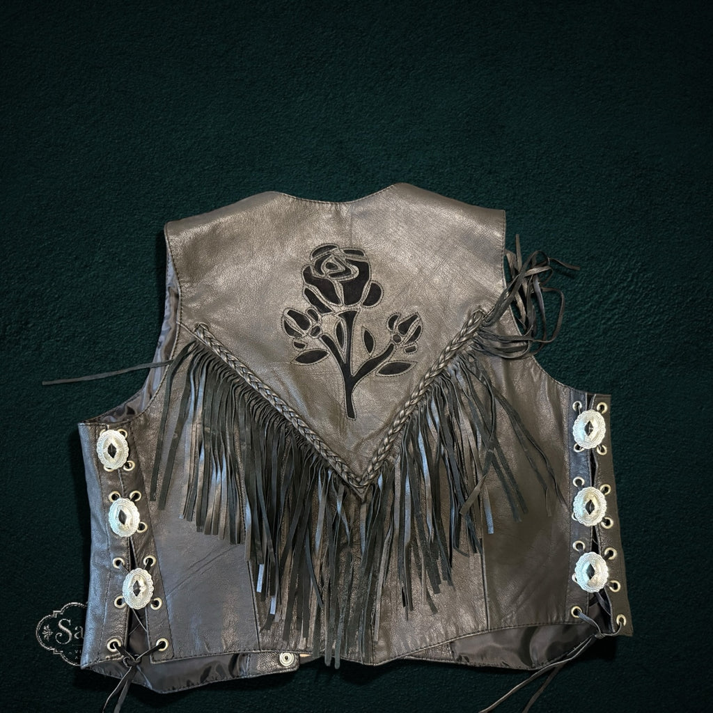 My Store black leather fringe vest with rose cut-out appliqué, braided trim, and silver concho side lace-up details.