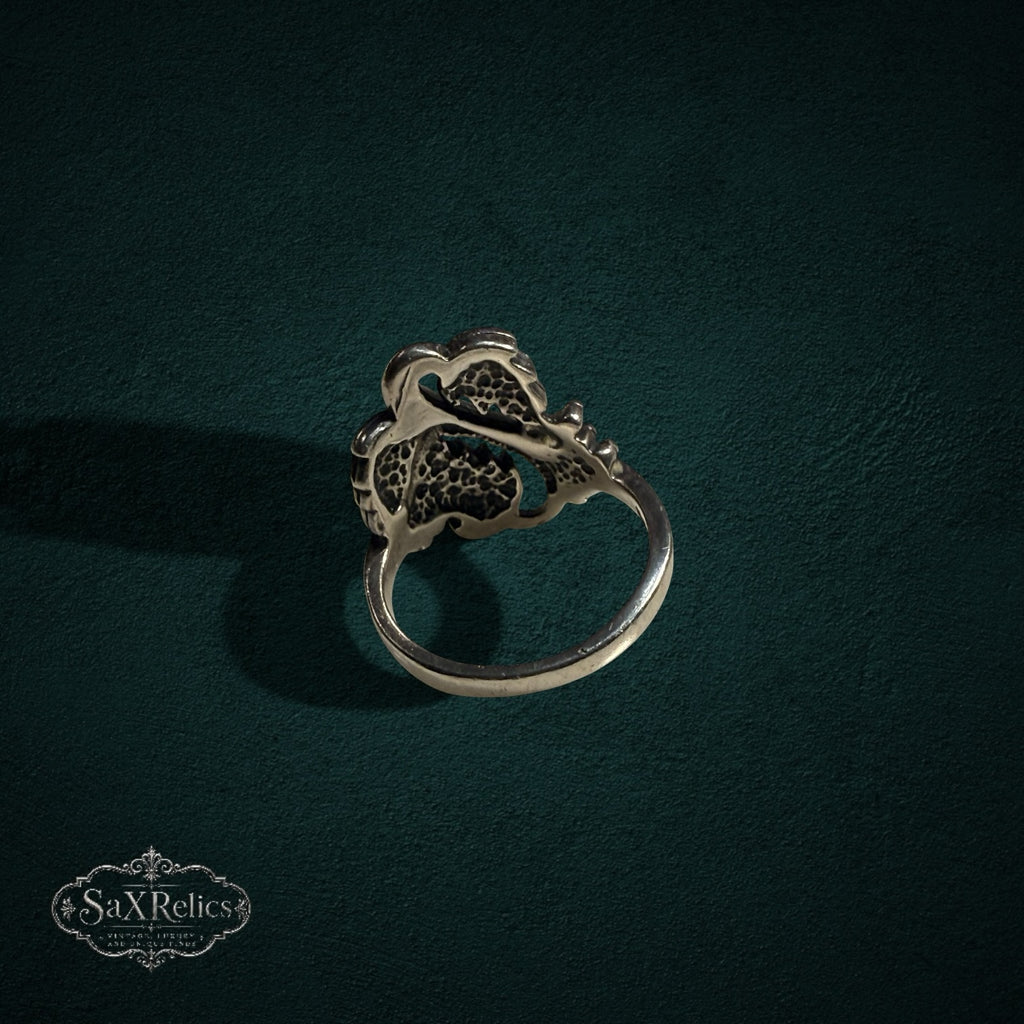 My Store SAXRelics sterling silver ring featuring an intricate botanical leaf and berry design with oxidized finish.