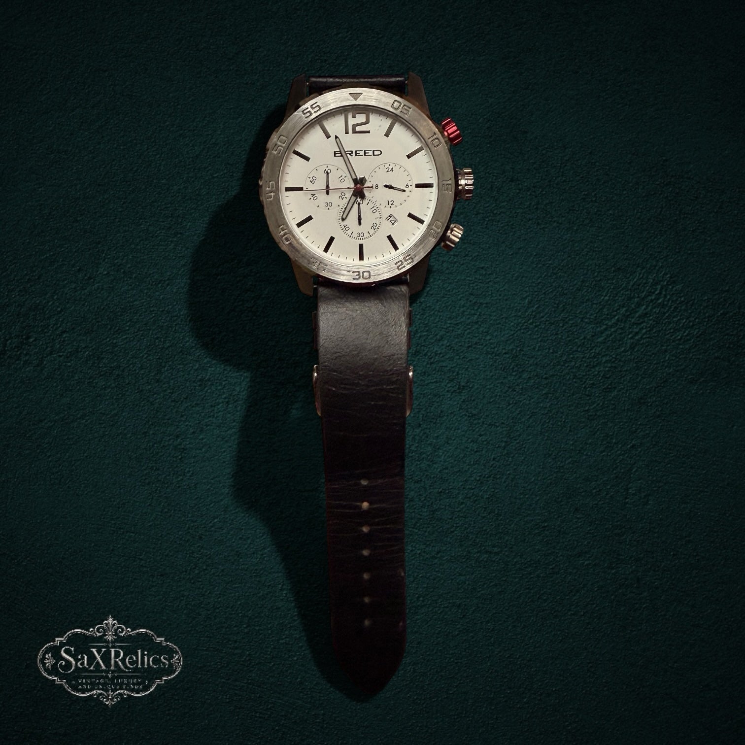 SaX Relics Breed chronograph watch showing the white dial and stainless steel case