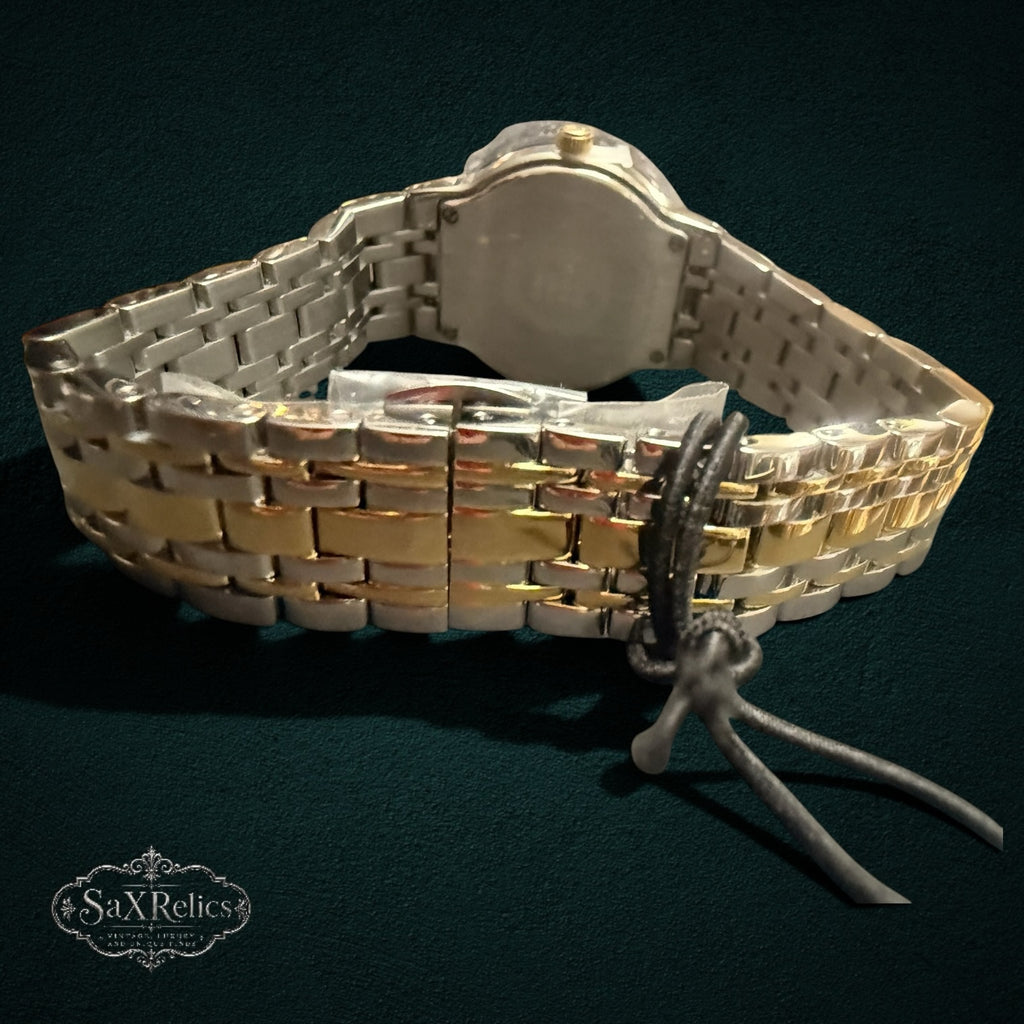 My Store Bulova two-tone stainless steel watch bracelet with silver and gold links and secure clasp
