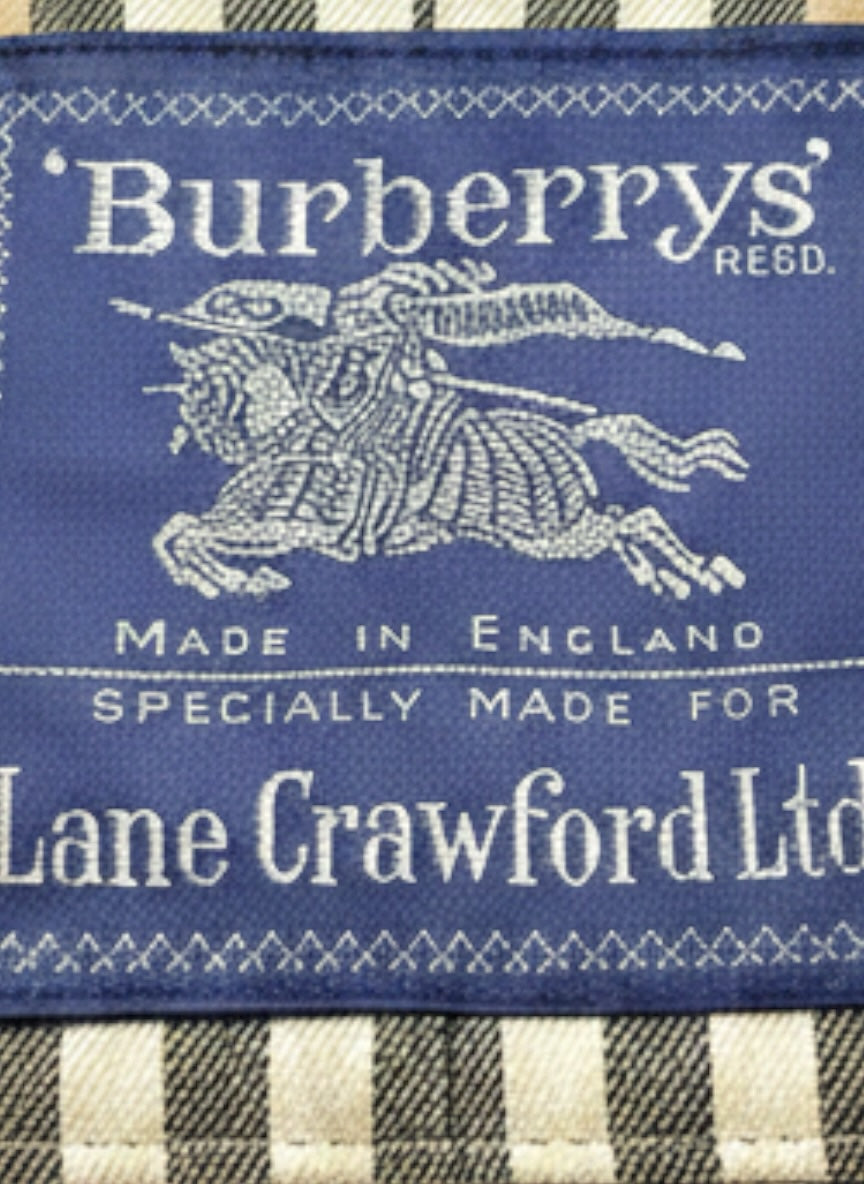 My Store vintage Burberrys trench coat blue fabric label with knight logo made in England for Lane Crawford Ltd