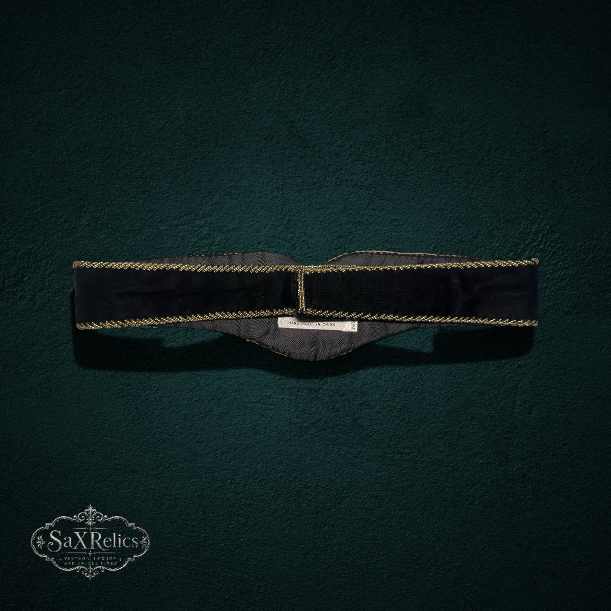 My Store vintage Christian Dior black velvet waist belt with gold-tone braided trim and intricate spiral embroidery.