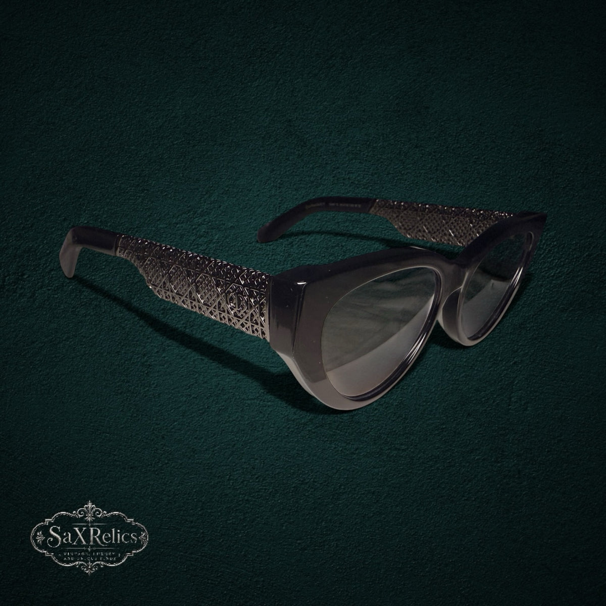 My Store Christian Dior Resille B1F black cat-eye sunglasses with intricate metallic latticework temple detailing.