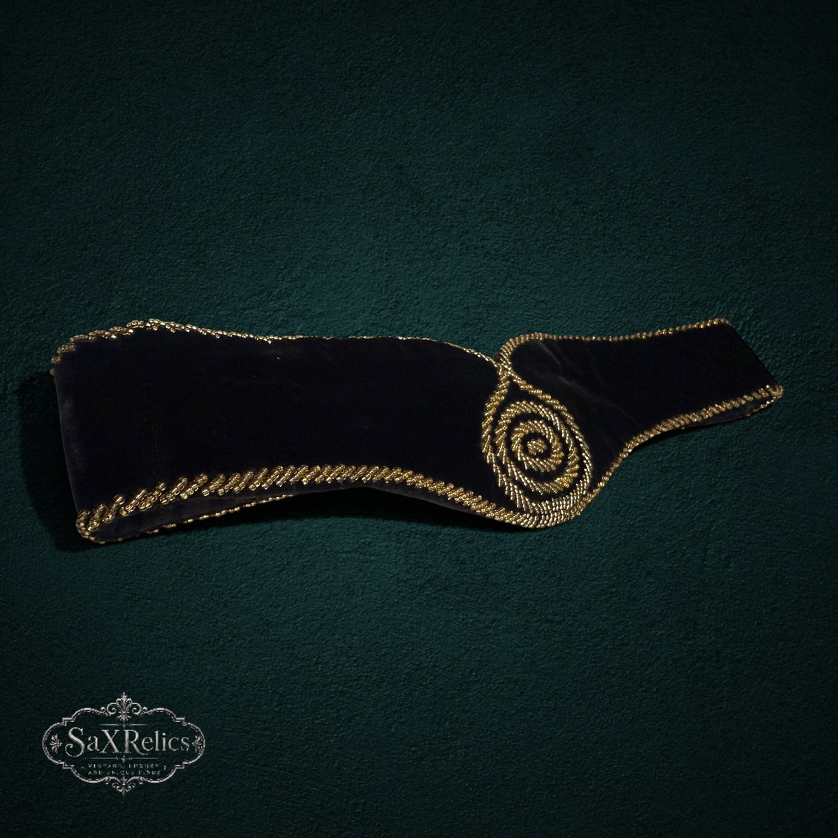 My Store vintage Christian Dior black velvet waist belt with gold braided trim and intricate spiral embroidery detail.