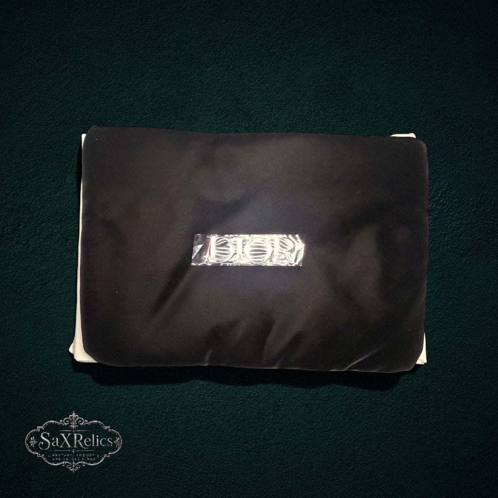 My Store Christian Dior black nylon accessory pouch with silver logo branding on a dark background