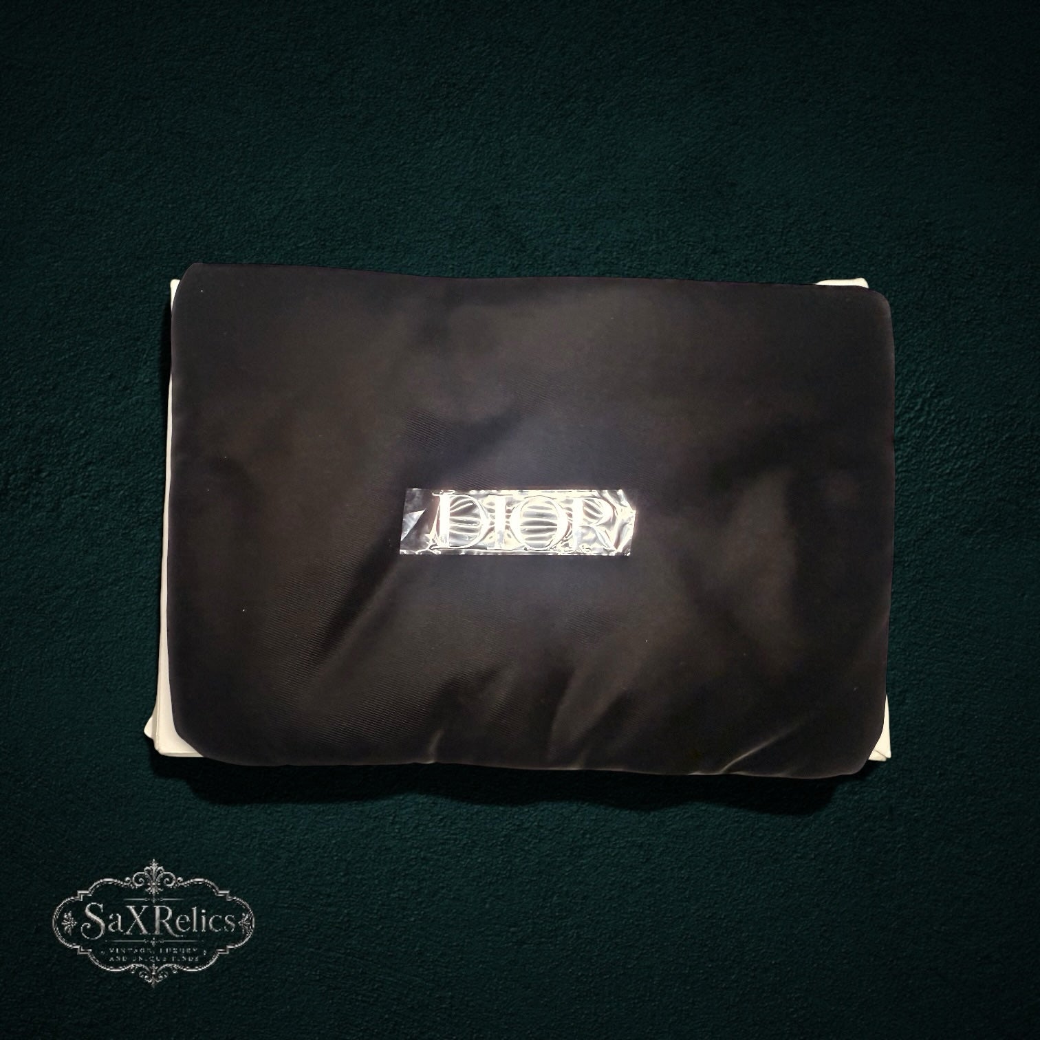 My Store Christian Dior black nylon accessory pouch with silver logo branding on a dark background