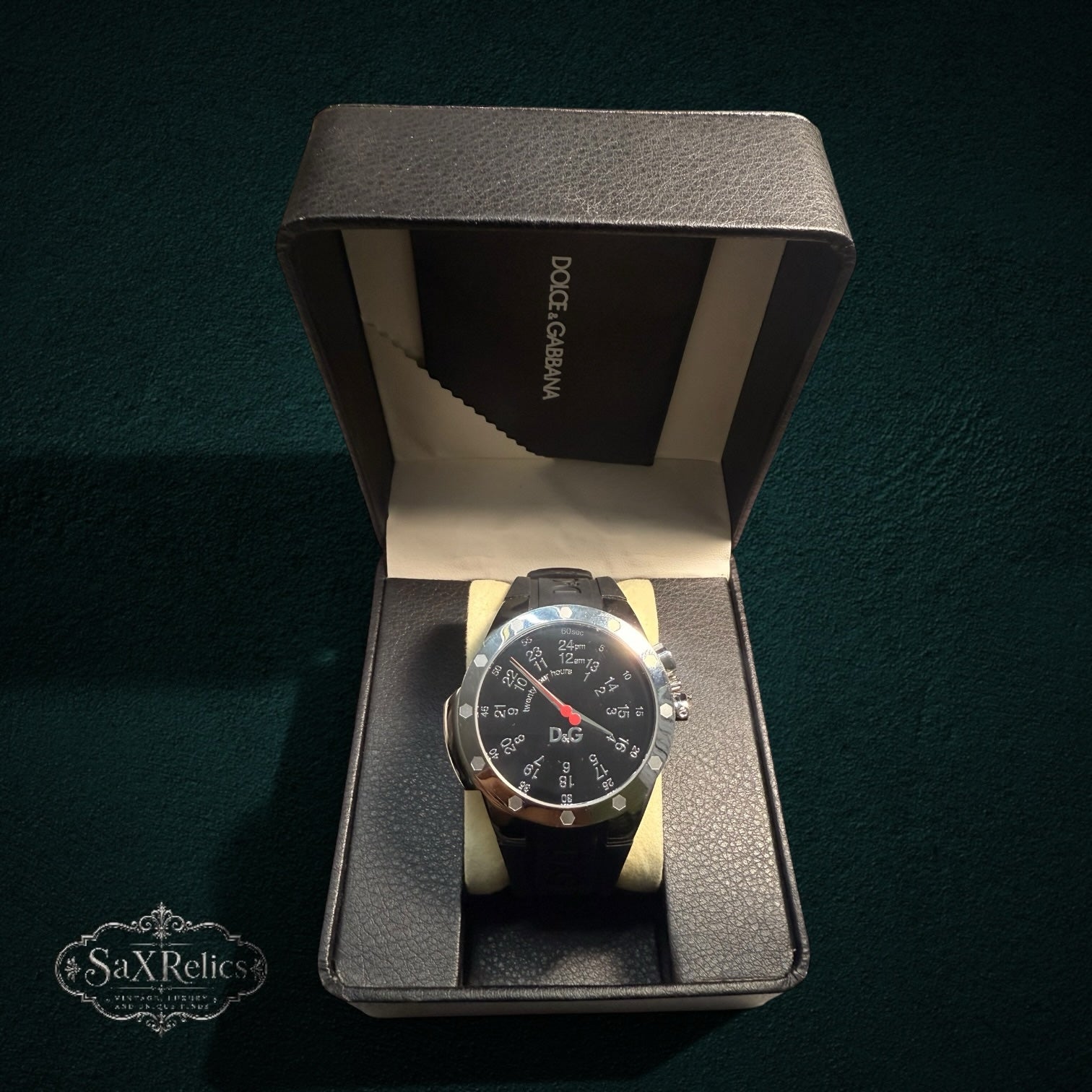 My Store Dolce & Gabbana analog watch with black rubber strap, 24-hour dial, and red second hand in presentation box.