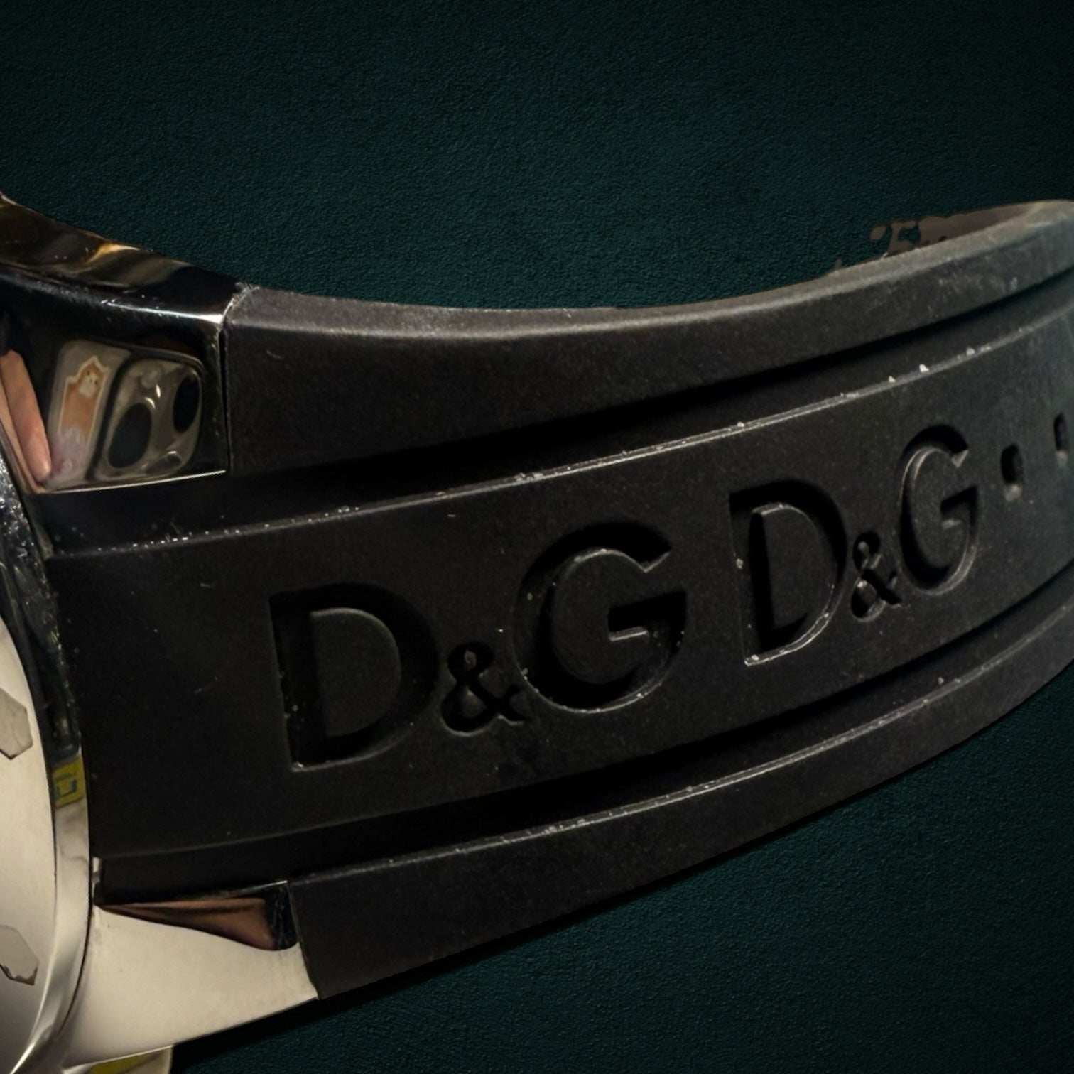 My Store Dolce & Gabbana wristwatch featuring a black rubber strap with embossed D&G logo and stainless steel case.