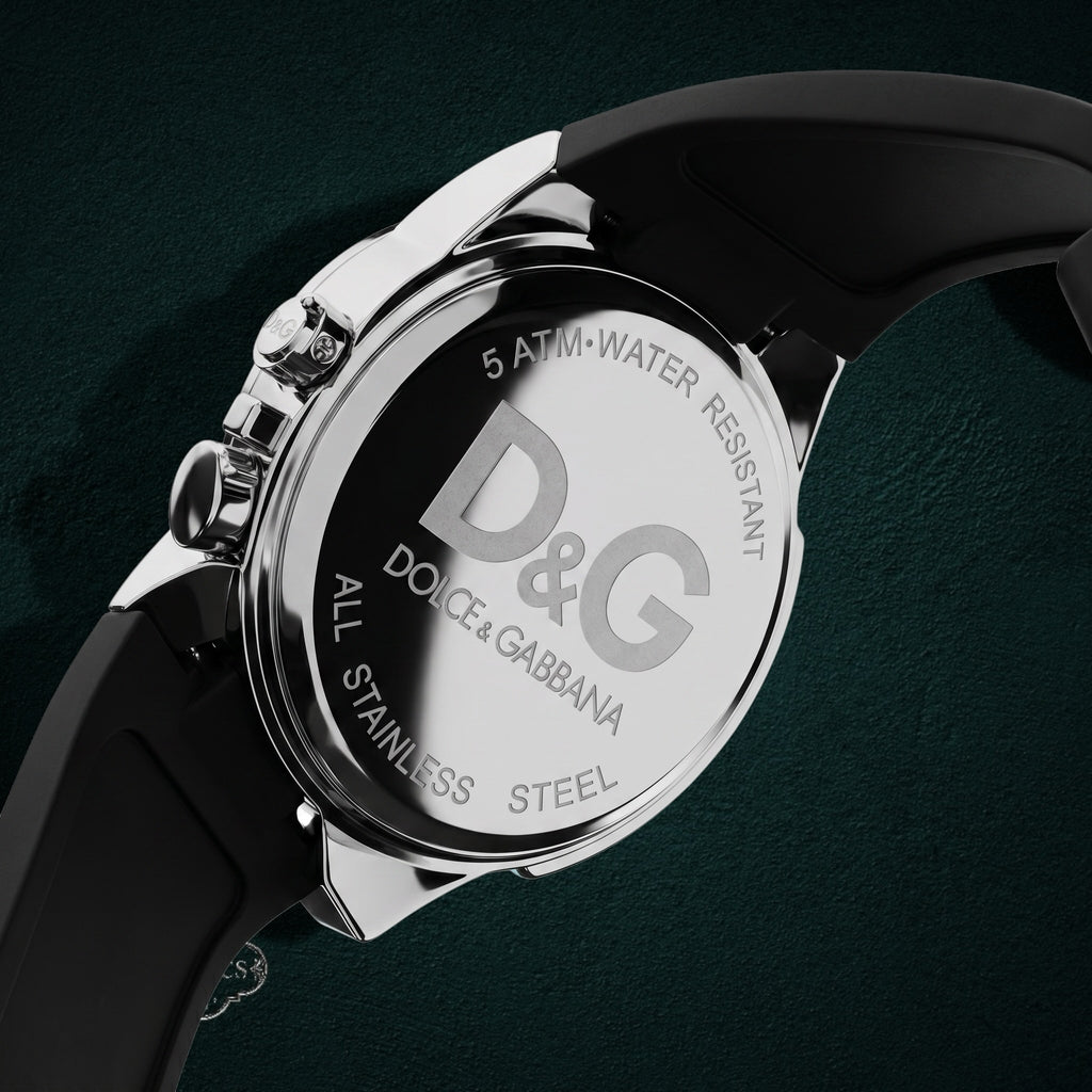 My Store Dolce & Gabbana stainless steel watch case back with black rubber strap and D&G logo engraving