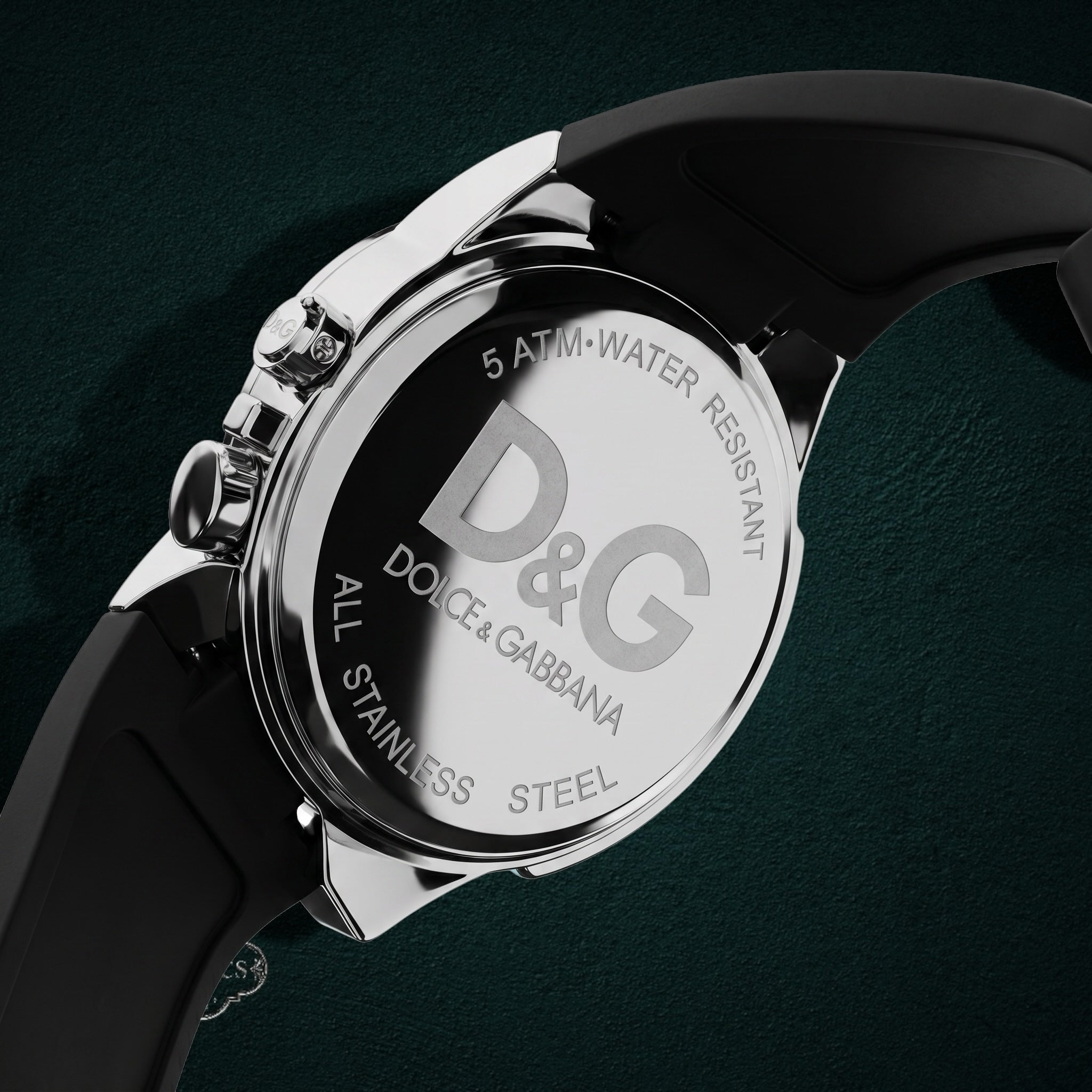 My Store Dolce & Gabbana stainless steel watch case back with black rubber strap and D&G logo engraving