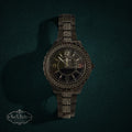 My Store EXPRESS dark metal link wristwatch with a crystal-encrusted bezel and matching bracelet accents