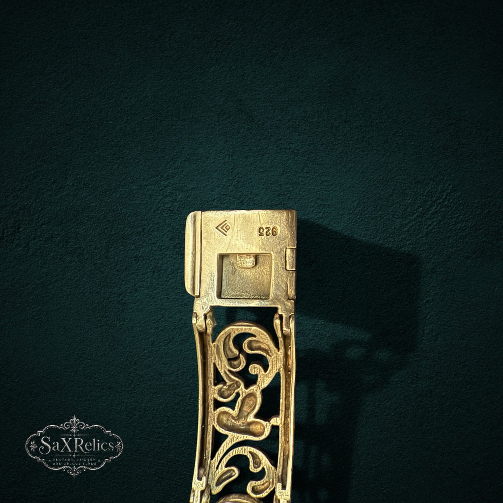 SaX Relics vintage sterling silver filigree bangle showing the 925 stamp at the clasp