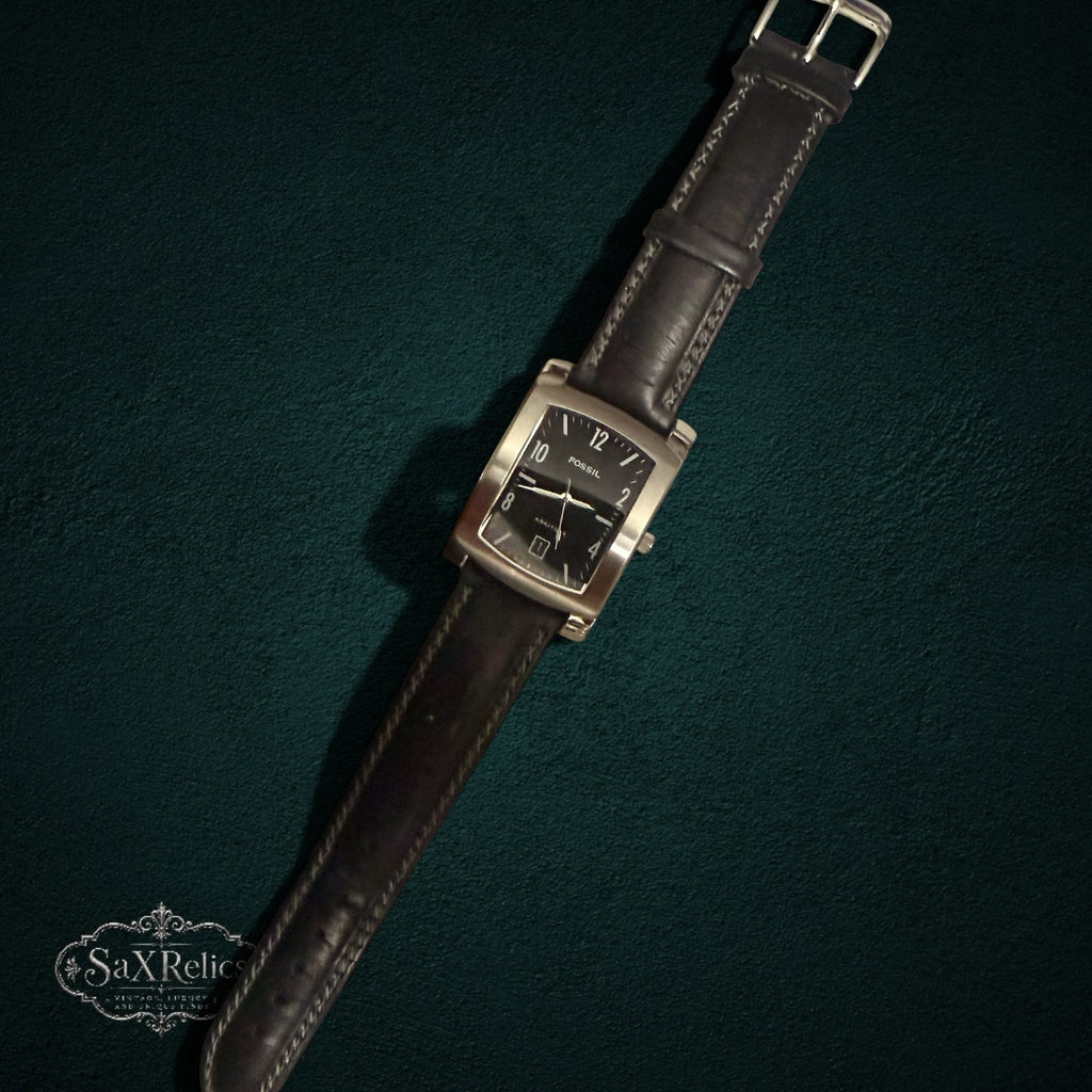 My Store Fossil Arkitekt rectangular men's watch with a black dial, stainless steel case, and dark leather strap.