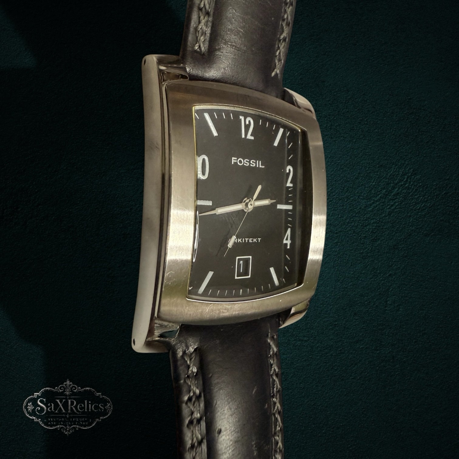 My Store Fossil Arkitekt rectangular men's watch with a brushed stainless steel case, black dial, and leather strap.