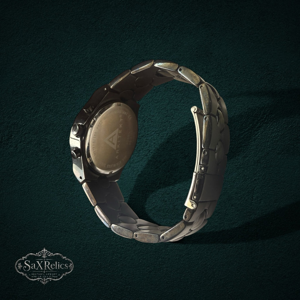 My Store Fossil Arkitekt stainless steel chronograph watch showing the articulated link bracelet and case back detail.