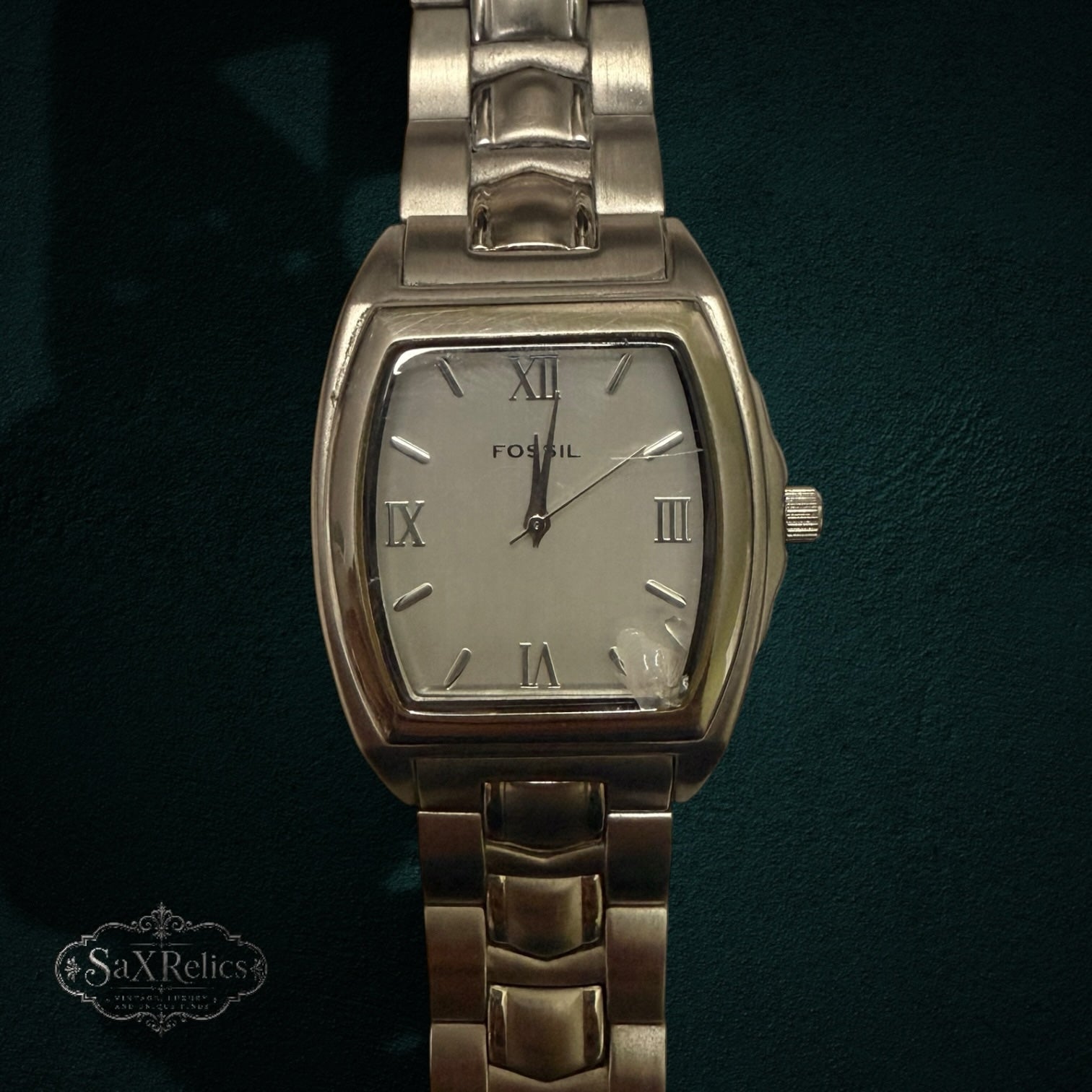 My Store Fossil silver-tone stainless steel tonneau watch with a link bracelet and Roman numeral dial.