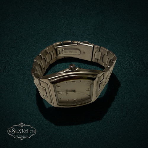 My Store Fossil silver-tone stainless steel tonneau-shaped wristwatch with a link bracelet and Roman numeral dial.