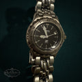 My Store Fossil Blue stainless steel analog wristwatch with a black dial and textured bezel on a link bracelet.