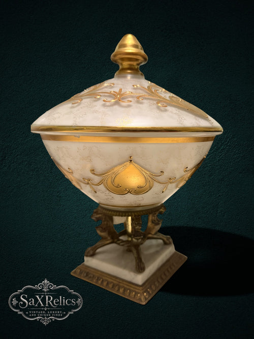 Vintage opaline glass lidded pedestal dish with gold gilt hearts and scrollwork on brass claw feet and marble base