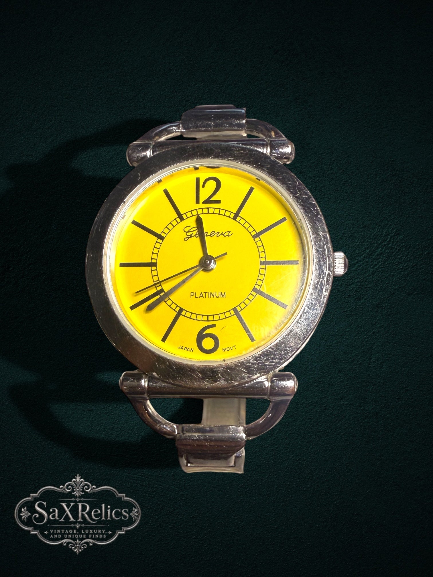 My Store Geneva Platinum analog wristwatch with a vibrant yellow dial and silver-tone bangle bracelet.