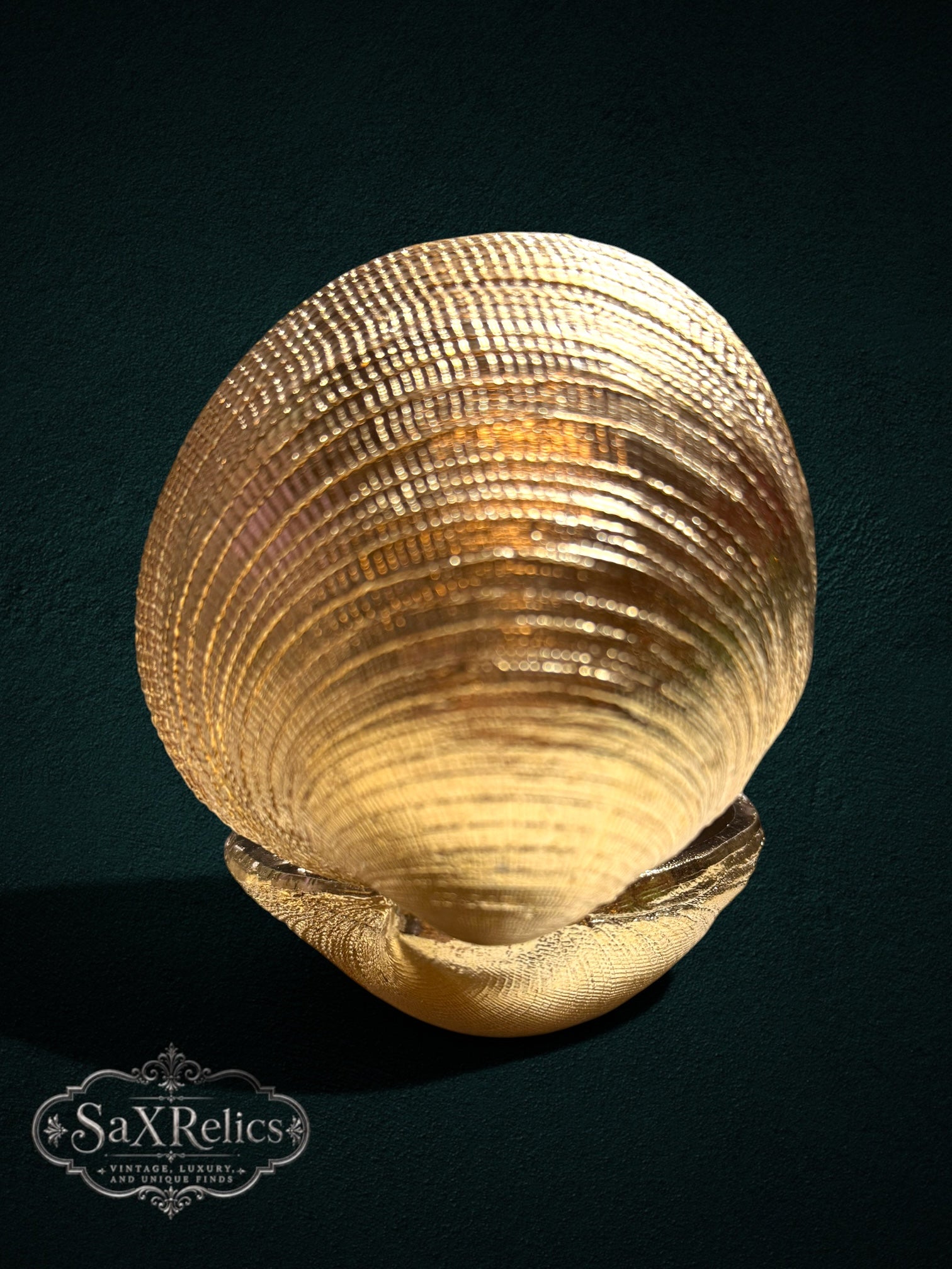 My Store gold-tone clam shell trinket box with textured ridges and a polished interior for jewelry storage.