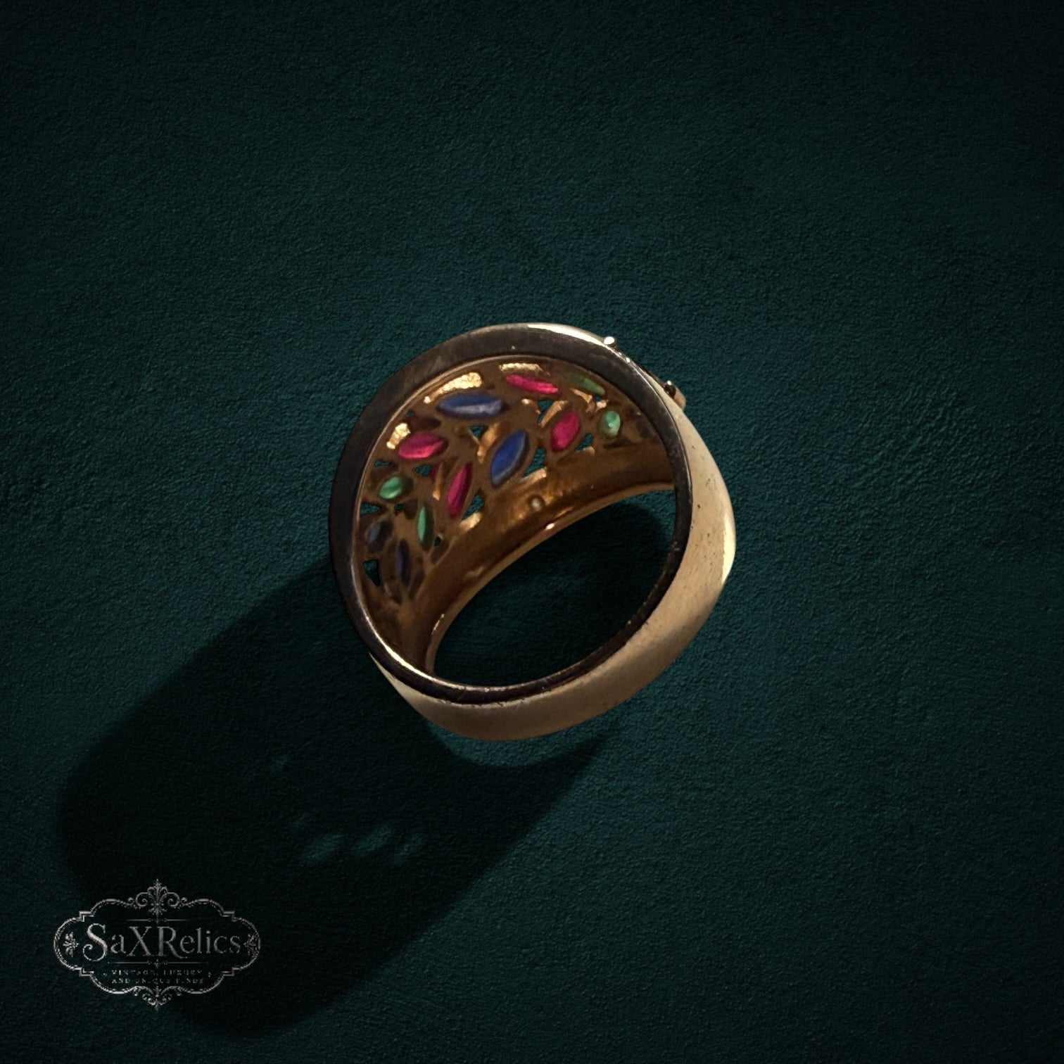 My Store gold-tone statement ring featuring marquise-cut rubies, sapphires, and emeralds in a leaf-inspired pattern.