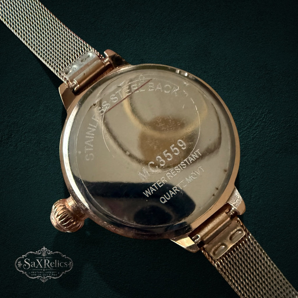 My Store gold-tone stainless steel watch case back with mesh strap and engraved details