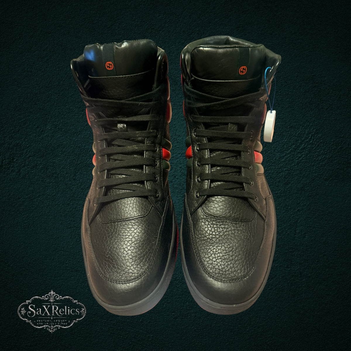 SaX Relics Gucci black leather high-top sneakers with red accents and lace-up closure