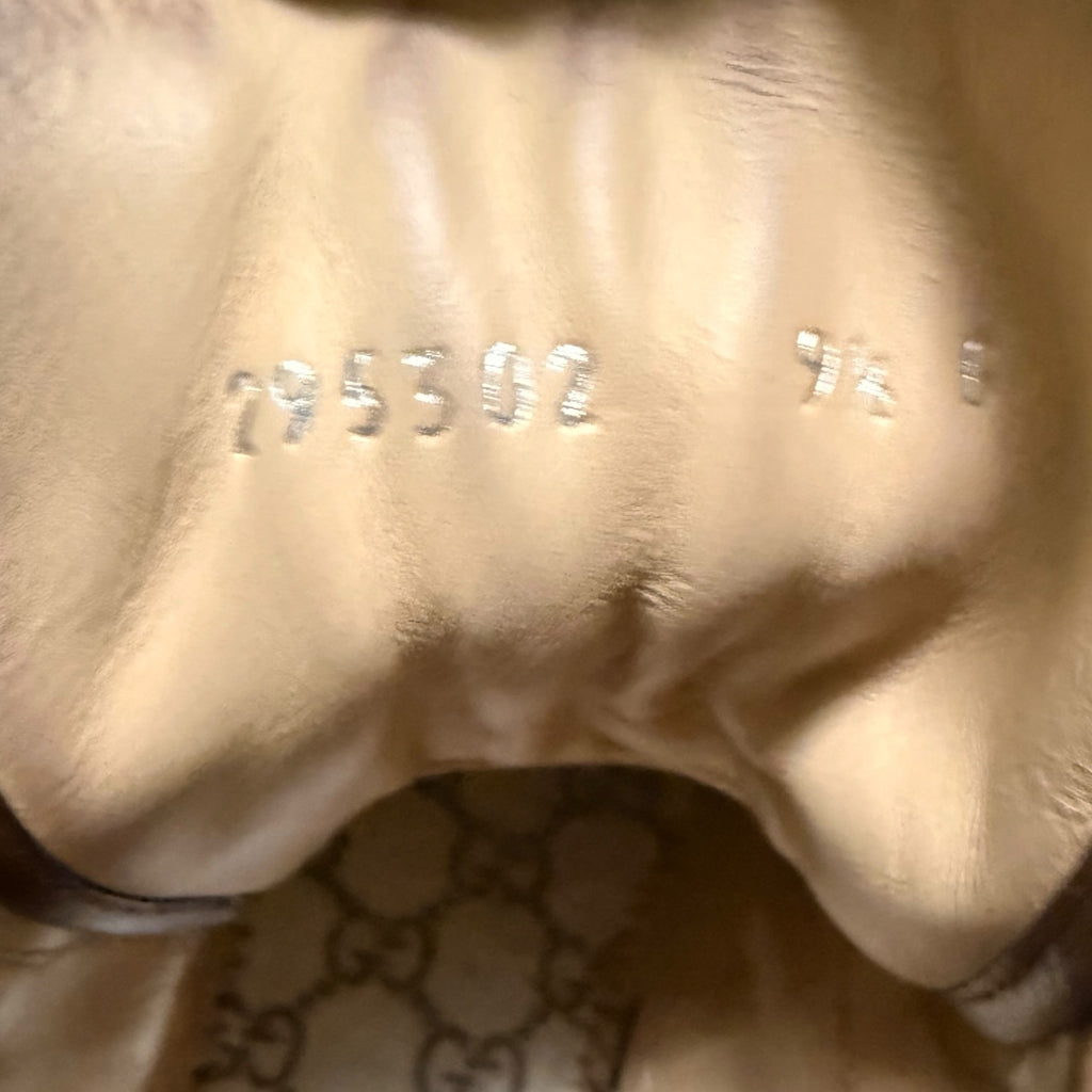 My Store Gucci leather high top sneaker interior showing embossed serial number and size detail