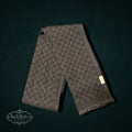My Store Gucci grey and charcoal wool scarf featuring the iconic GG monogram pattern and delicate fringe edges.