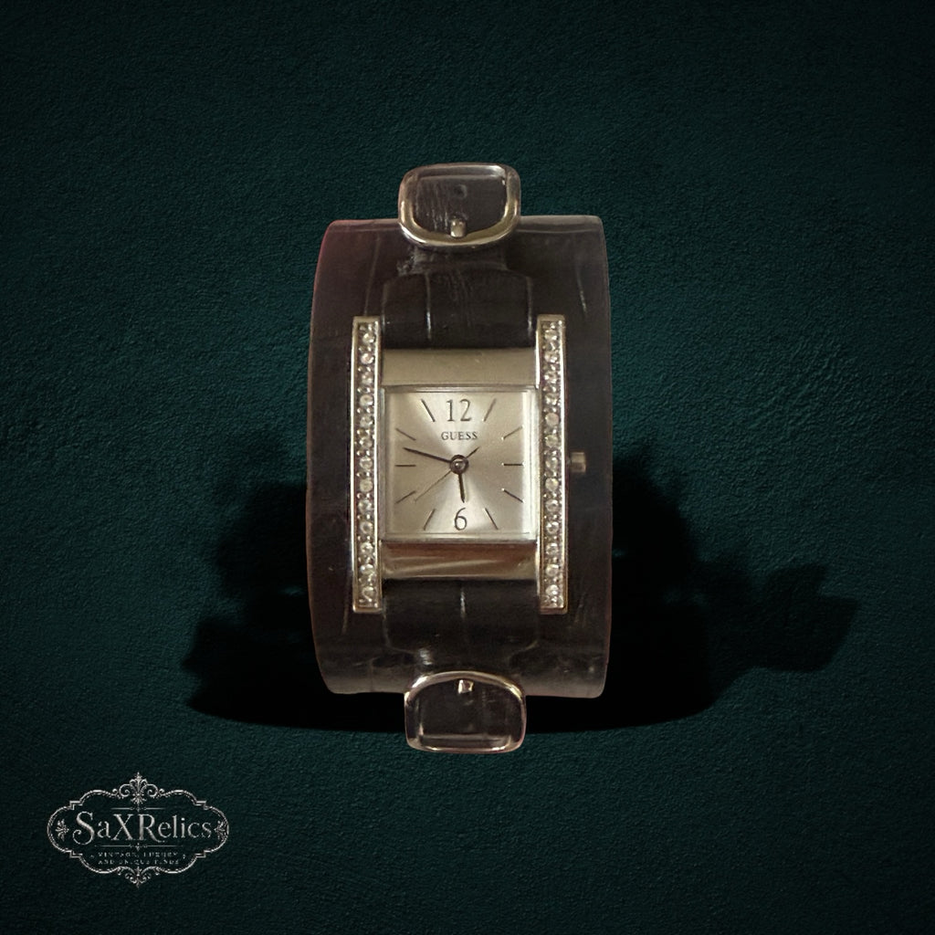 My Store GUESS rectangular silver-tone watch with crystal accents on a wide dark brown crocodile-embossed leather cuff