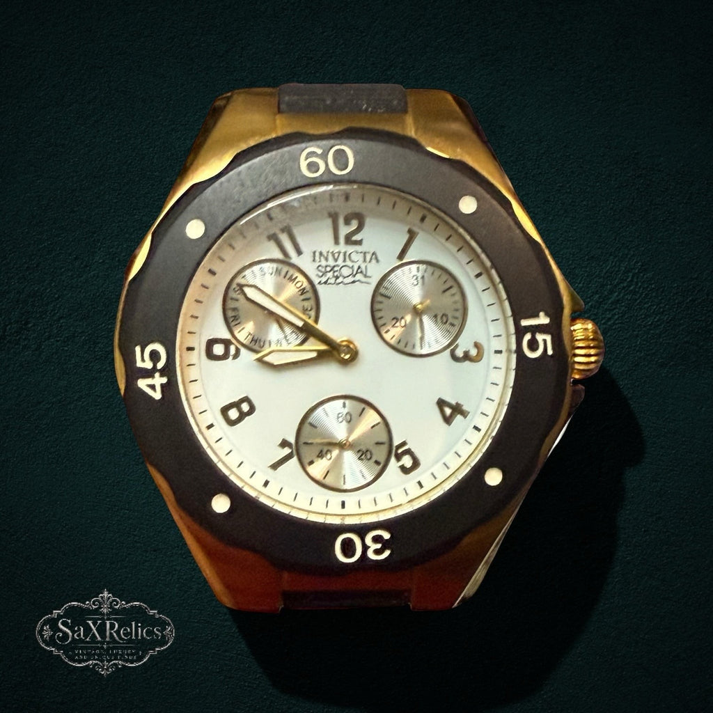 SaX Relics Invicta Angel 18797 multi-function watch on its black silicone strap